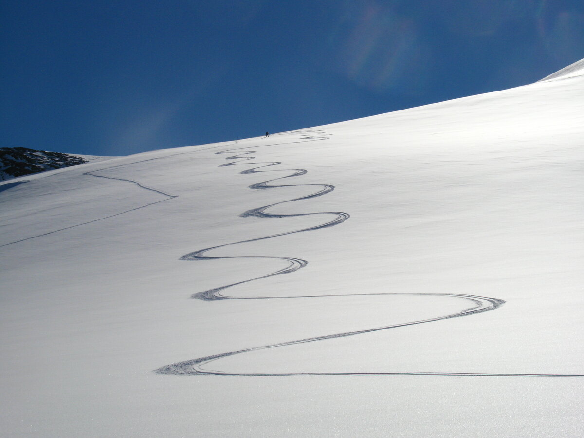 Ski tracks on a pristine slope near Three Glaciers